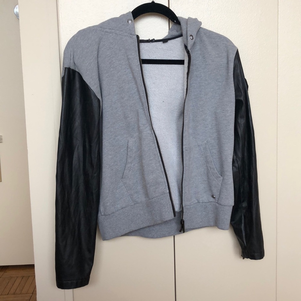 Grey zip up hoodie with vegan leather sleeves